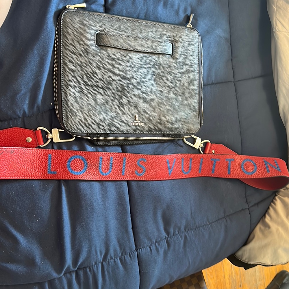 Serapian file folder with red Louis Vuitton Strap